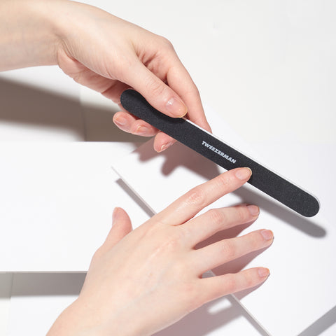 Model using professional nail file