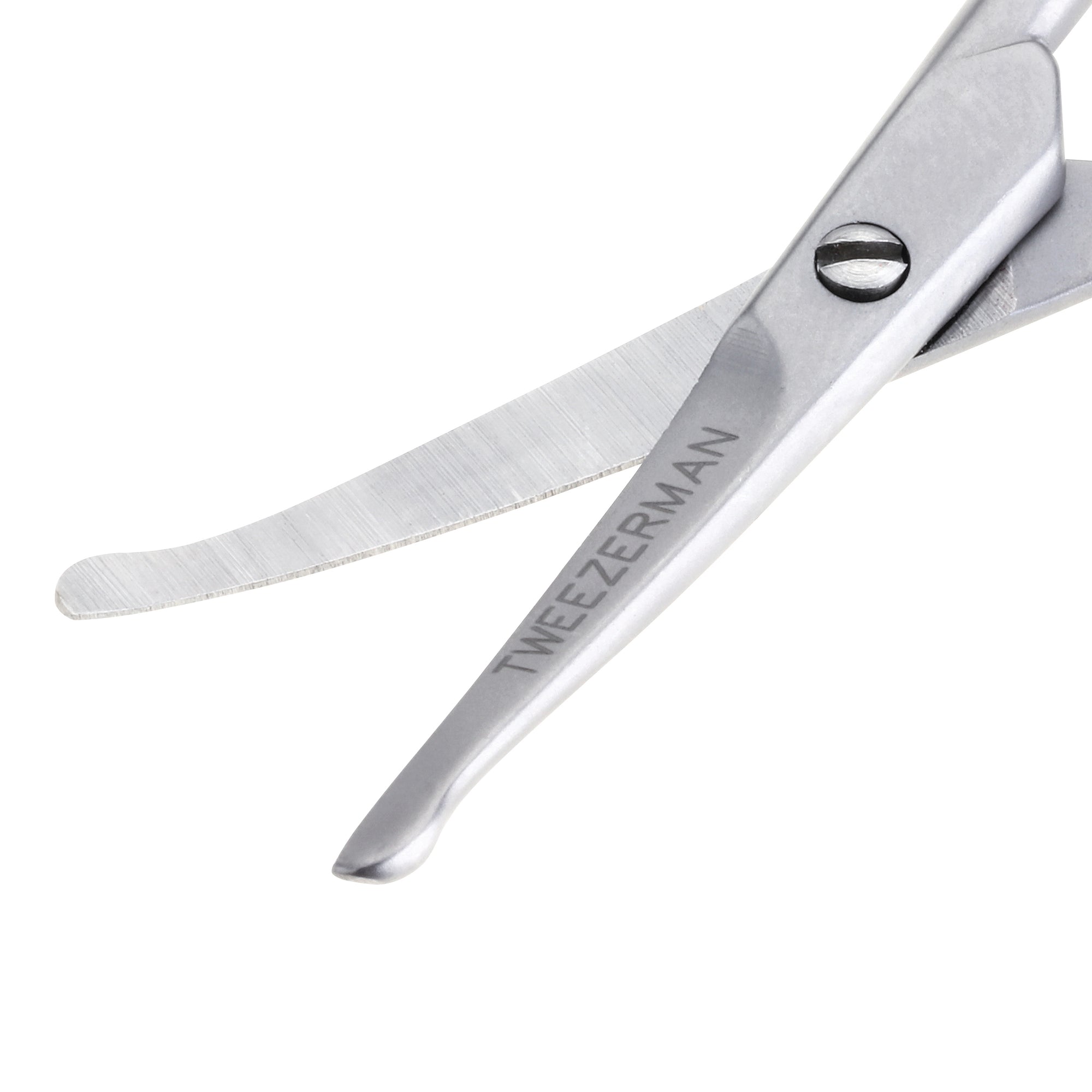Curved blades of facial hair scissors with rounded tip