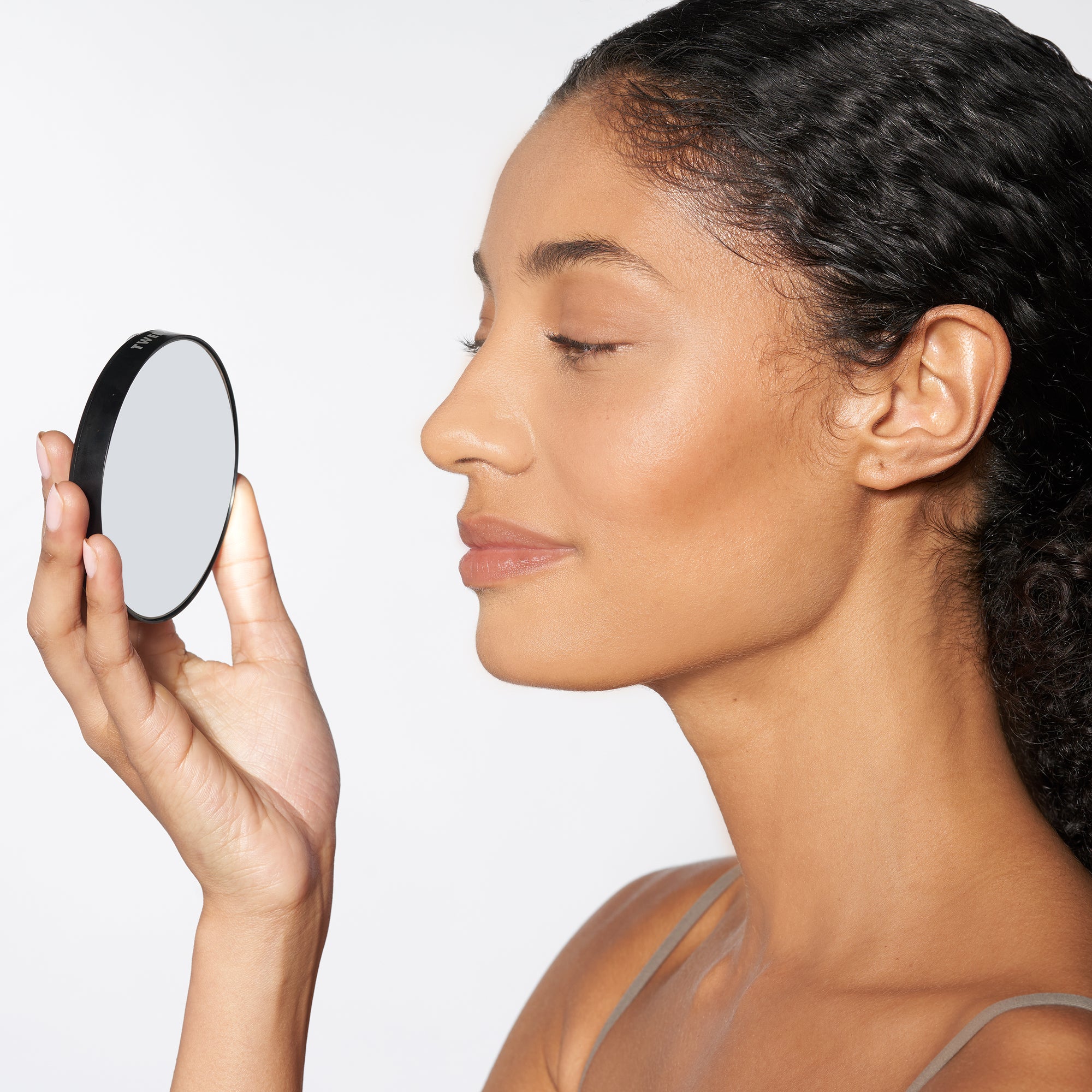 Model using Tweezermate 12X Magnification Mirror