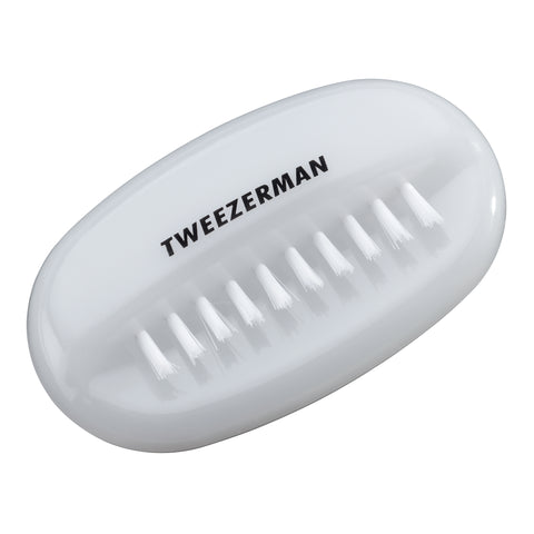 White oval shaped dual nail brush top view