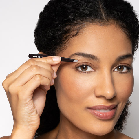 Model Using Black Slant Tweezer