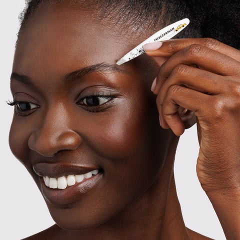 Model using the NYC Mini Slant Tweezer