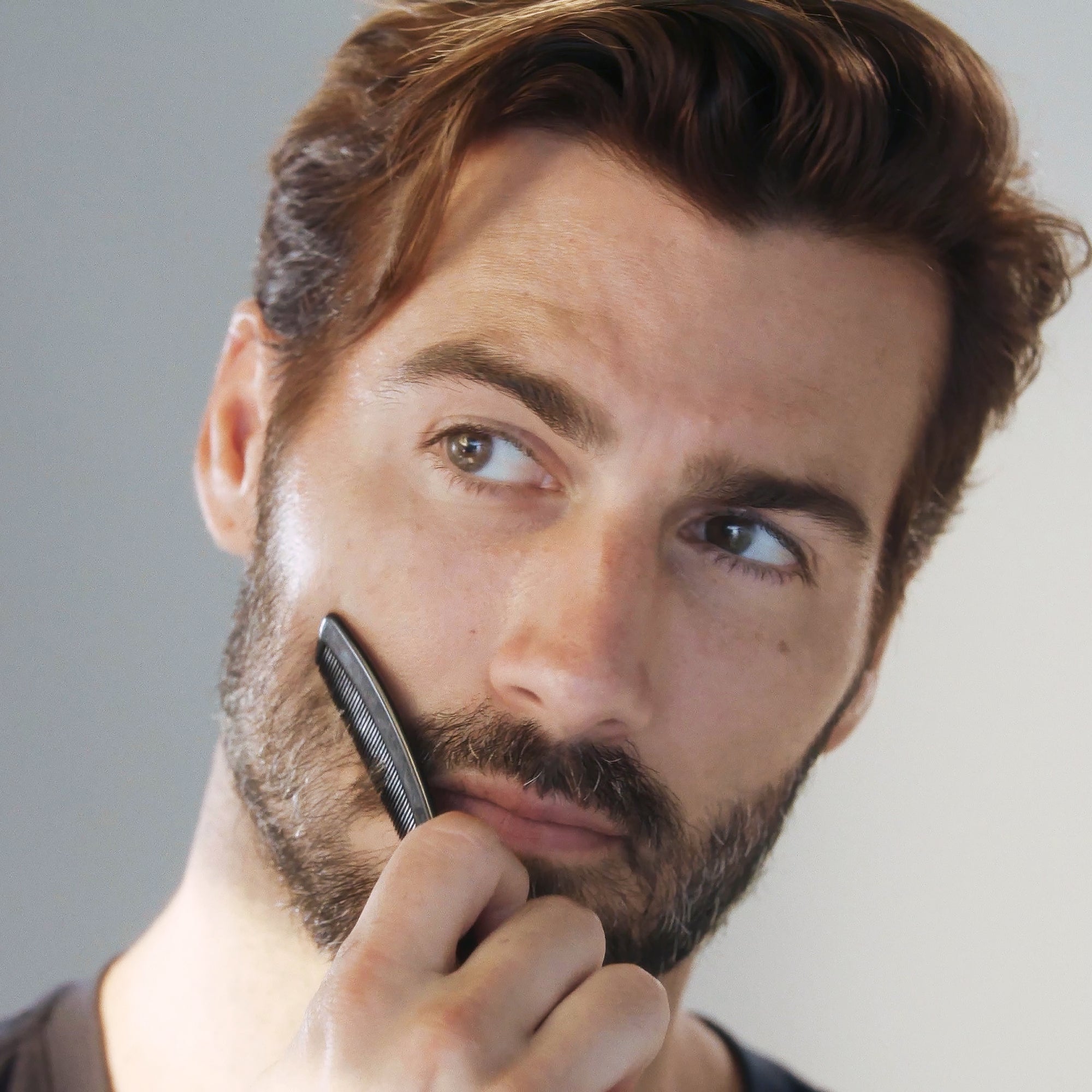 Model using Moustache Comb