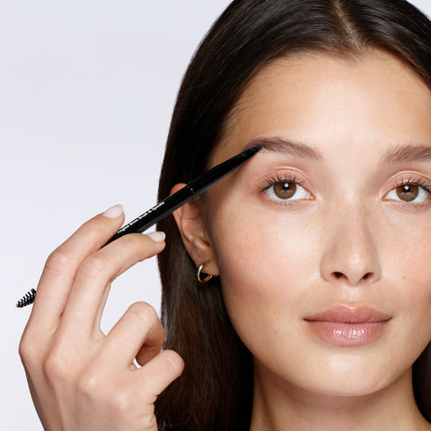 Model using Angled brush of Angled Brow Brush and Spoolie