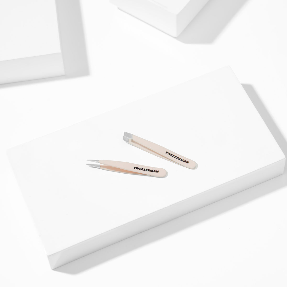 Evening Glow Micro Mini Tweezer Set placed on a white block tray