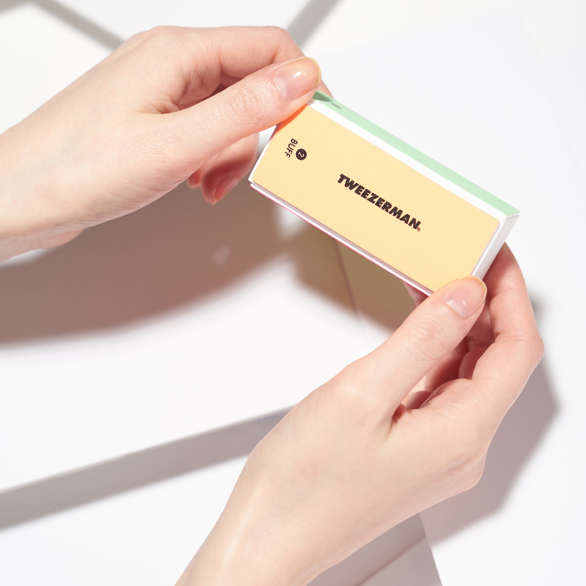 Model using neon file buff smooth and shine block