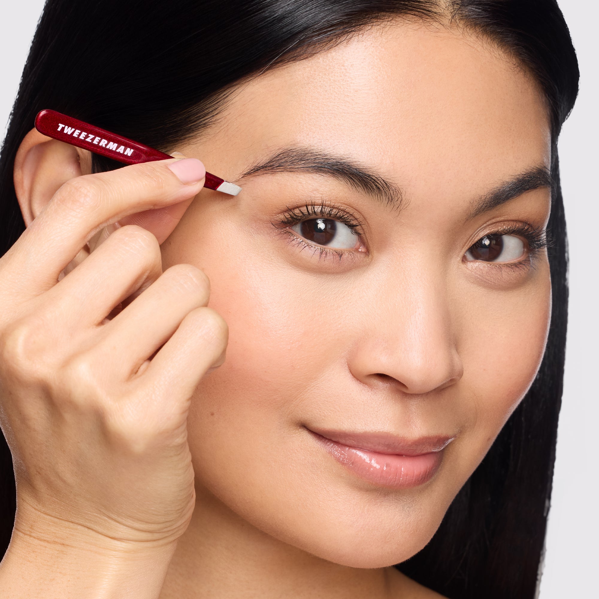 Model using Vintage Rose Mini Slant Tweezer
