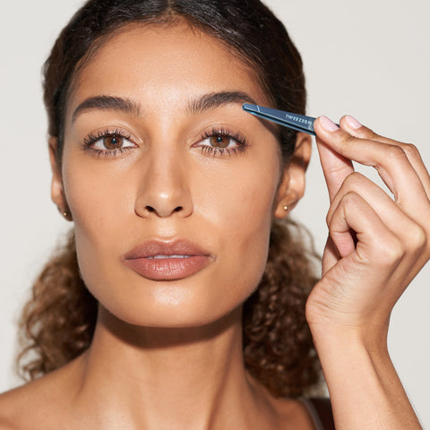 Model using Metallic Full Blue Slant Tweezer
