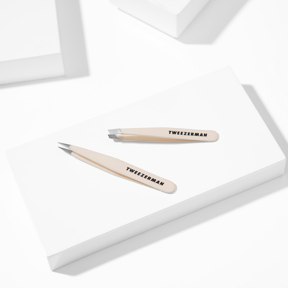 Evening Glow Mini Tweezer Set placed on a white block tray